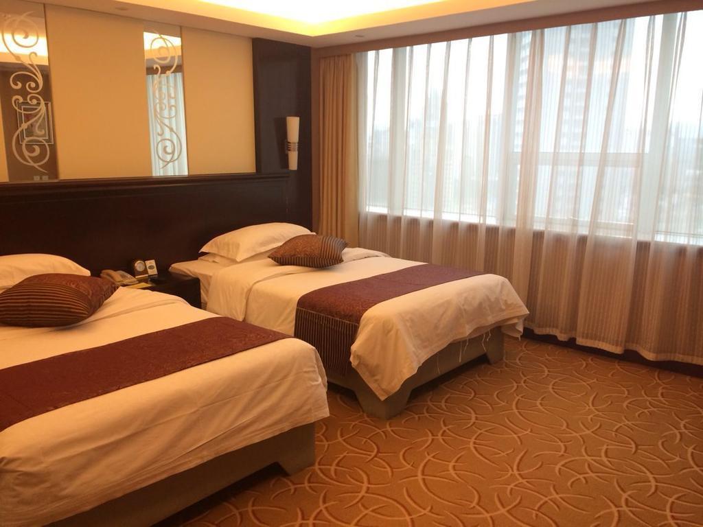 קונמינג Green Land Hotel חדר תמונה